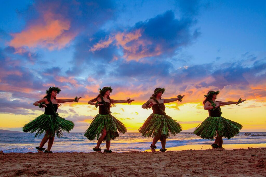 Hula dancers in a row at sunset on the Island of Maui, Hawaii