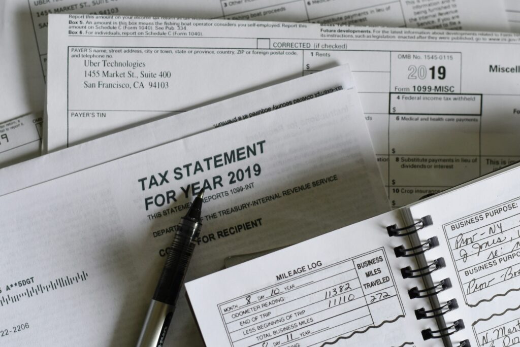 An image that shows a collection of tax-related documents and forms